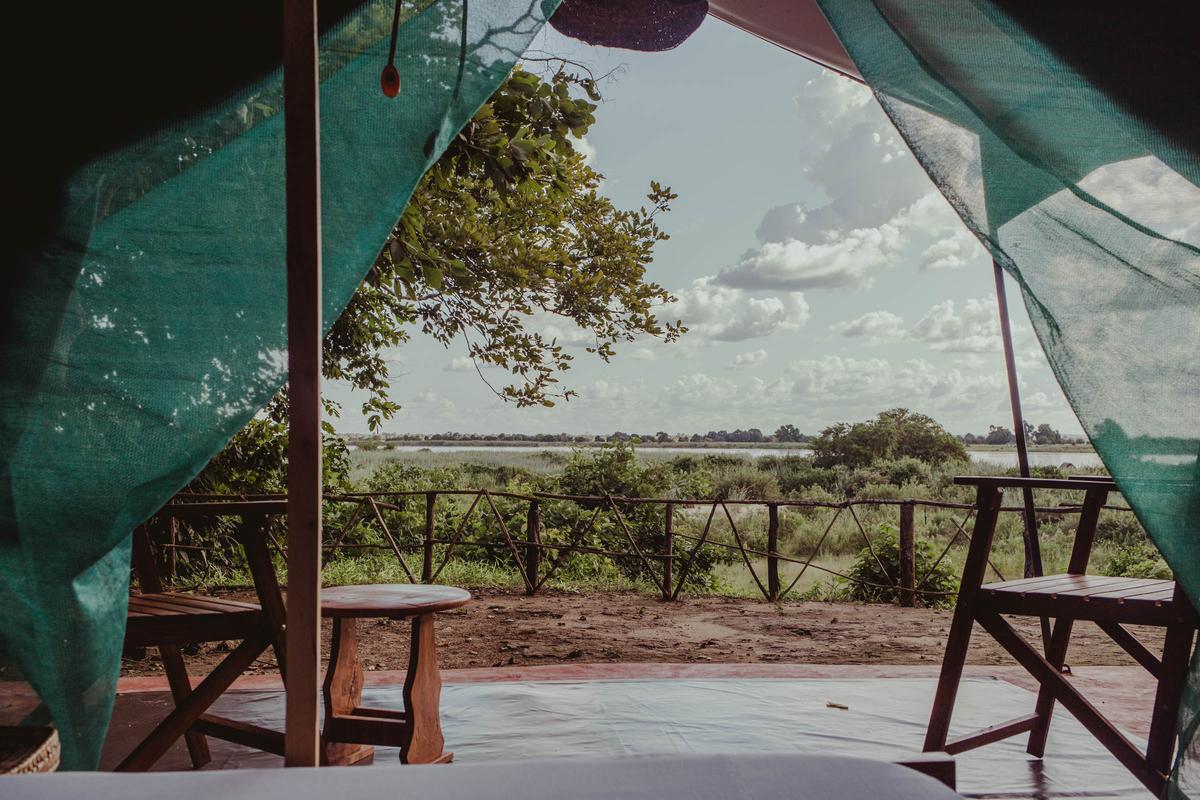 View of the savannah from a safari tent veranda