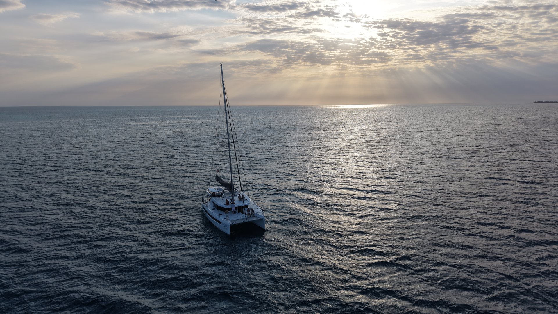 Catamaran sailing at sunset off Zanzibar